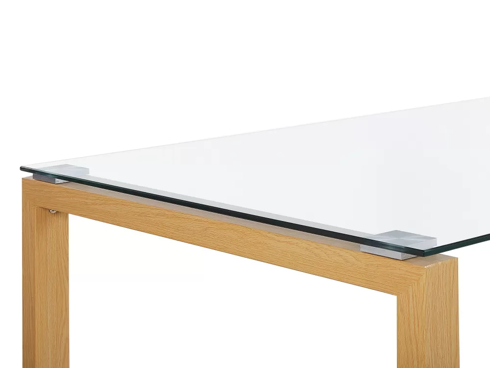 Beliani Tavira - Tavolo da pranzo contemporaneo con base metallica e piano in vetro, finiture in legno chiaro 130x80 cm